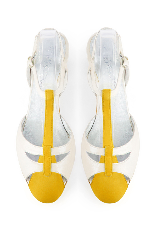 French elegance and refinement for these yellow and off white dress open back T-strap shoes, 
                available in many subtle leather and colour combinations. Its comfortable fit will accompany you until the end of the night.
Its charming, playful cutout gives you plenty of customization options.  
                Matching clutches for parties, ceremonies and weddings.   
                You can customize these shoes to perfectly match your tastes or needs, and have a unique model.  
                Choice of leathers, colours, knots and heels. 
                Wide range of materials and shades carefully chosen.  
                Rich collection of flat, low, mid and high heels.  
                Small and large shoe sizes - Florence KOOIJMAN